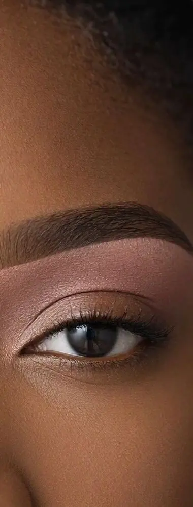 Soft pink eye makeup and brow shaping